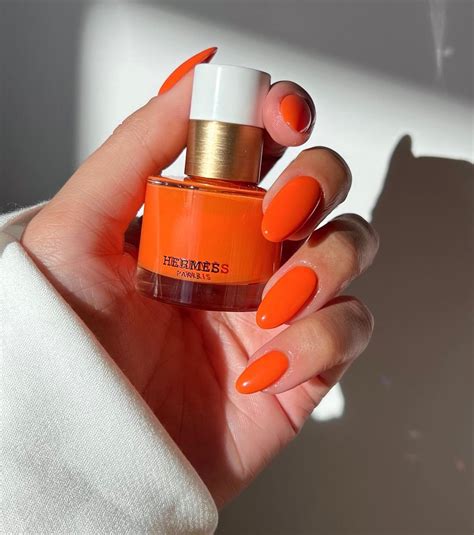 orange Hermes nail polish